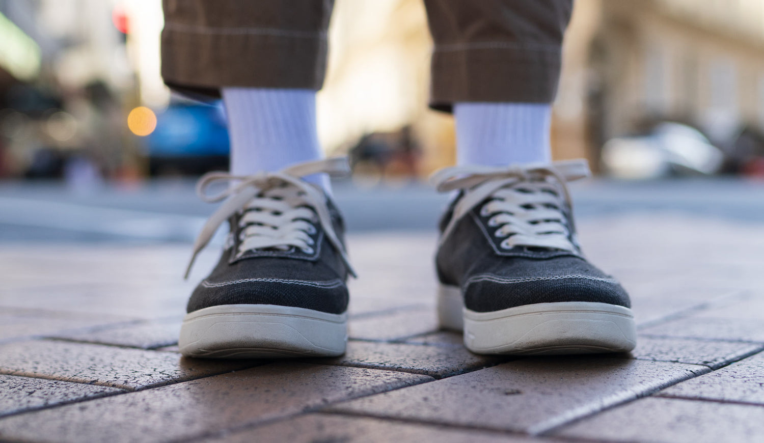 Close up of Orba Ghost Sneakers on foot