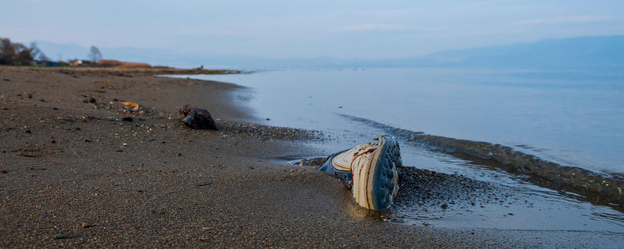 Shoe waste on beach