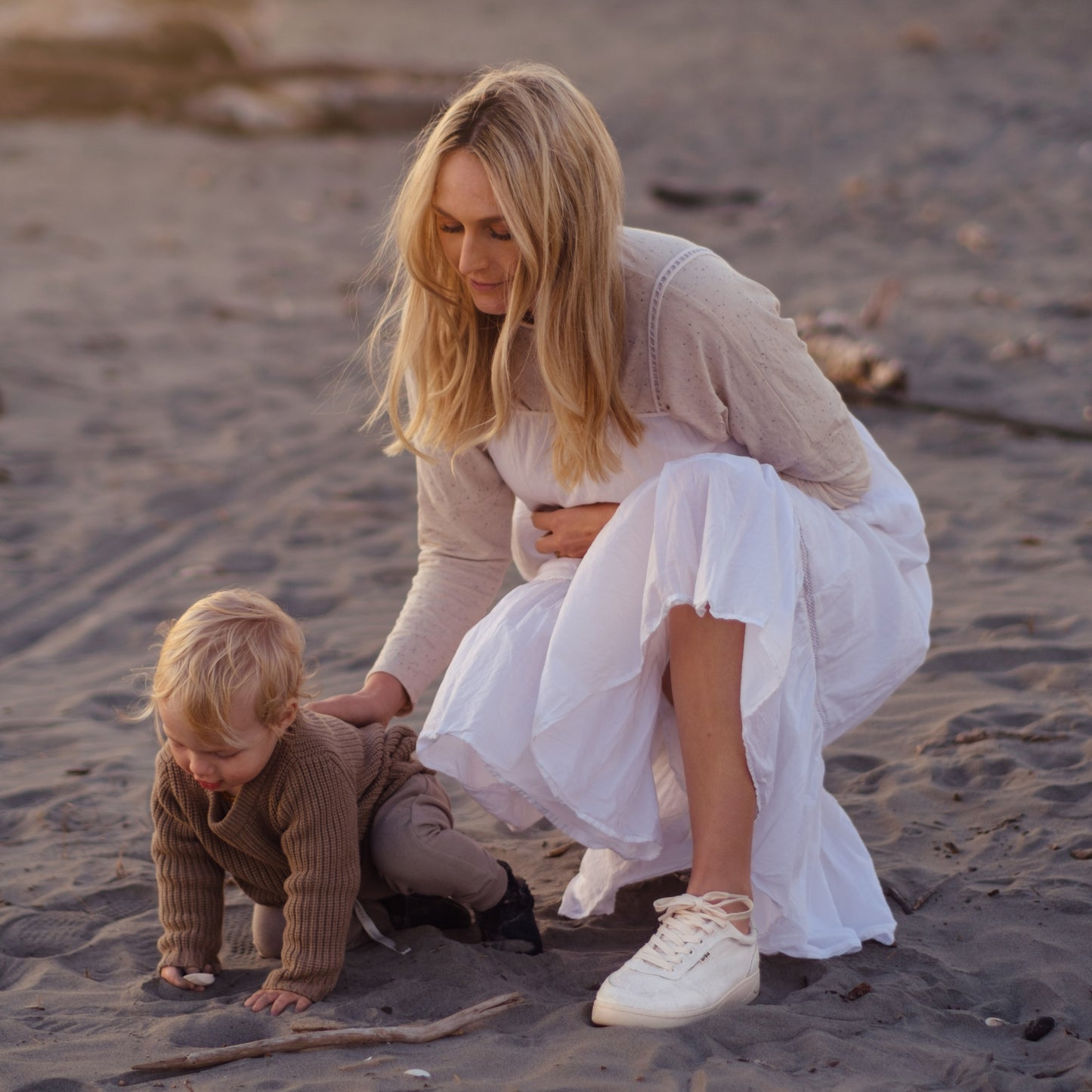 Mother playing with child wearing Orba Ghost Sneakers